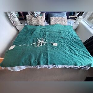 Heated teal green blanket/throw